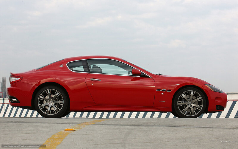 red sports car on rooftop