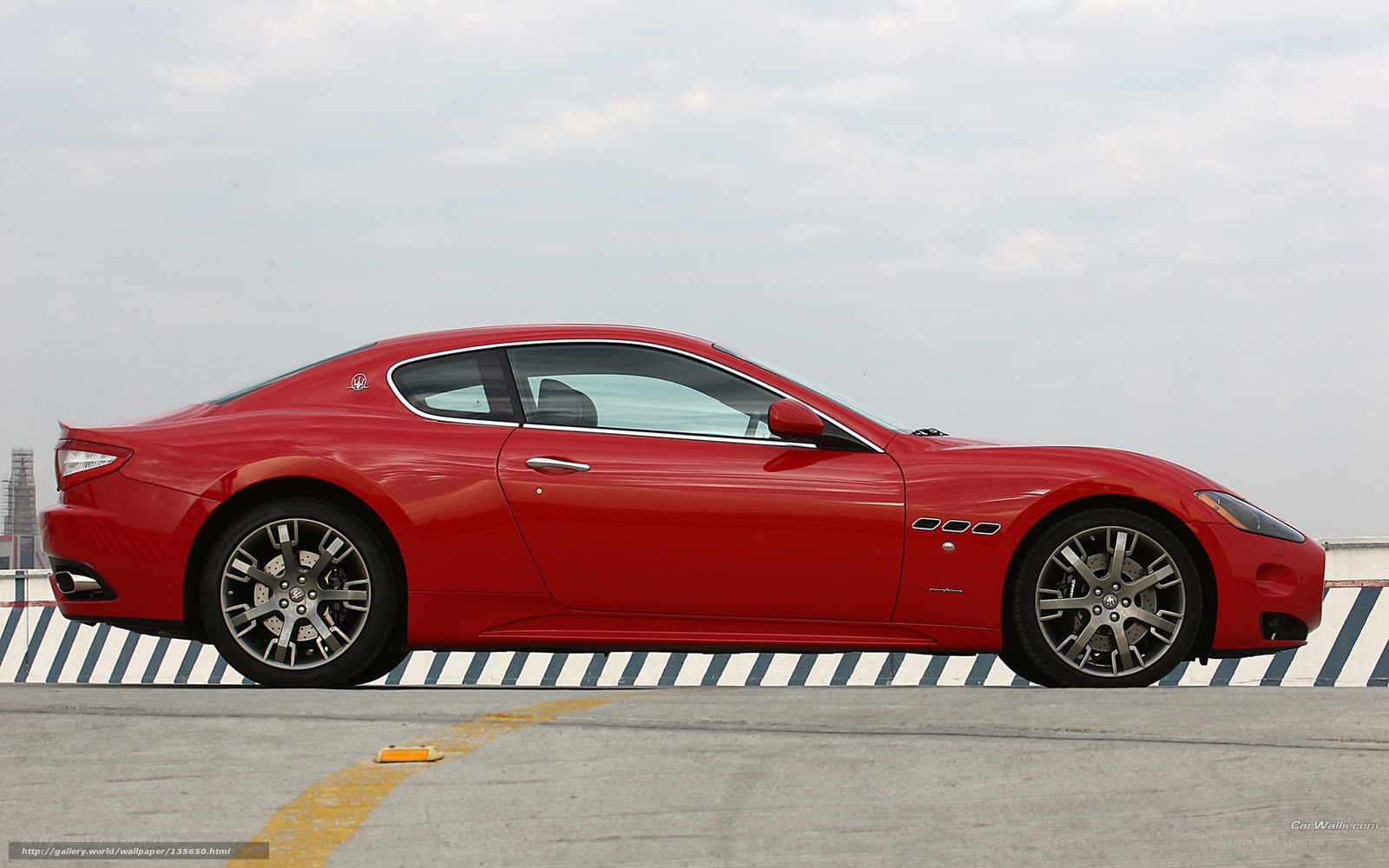 red sports car on rooftop