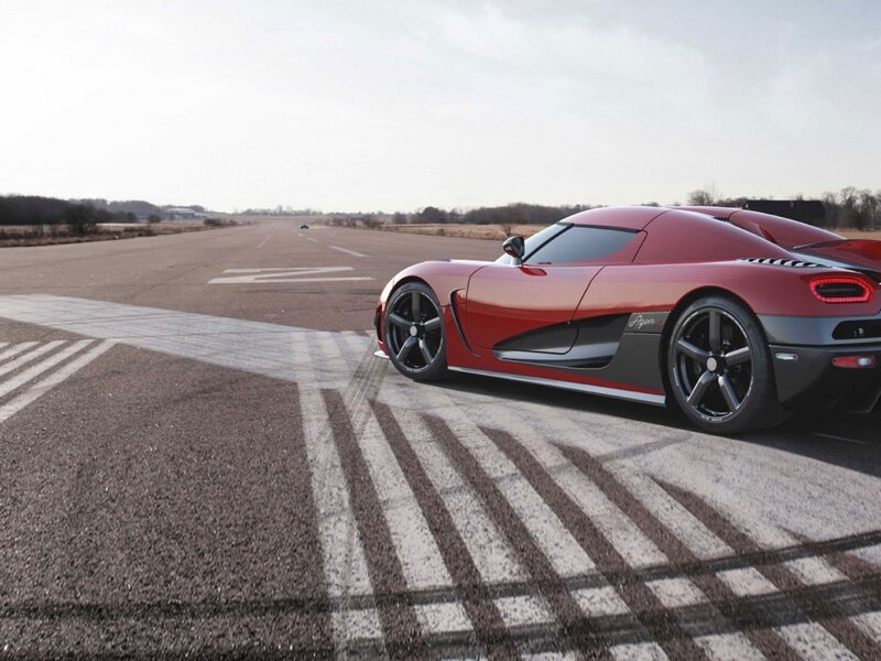 Red Sports Car on Runway — Dramatic, Afternoon