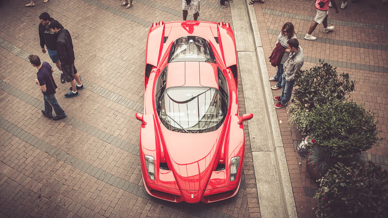 Red Sports Car on Sidewalk