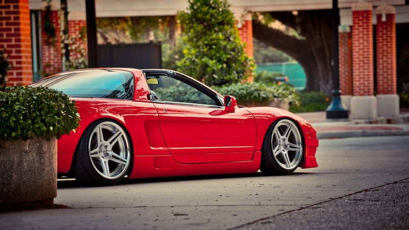 red sports car on street