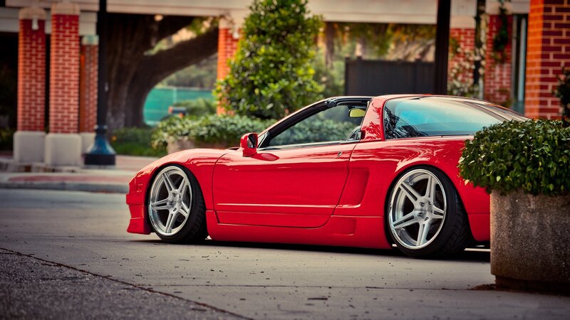 red sports car on street