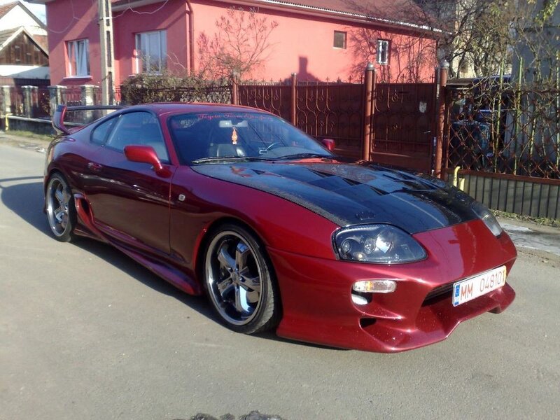red sports car on street