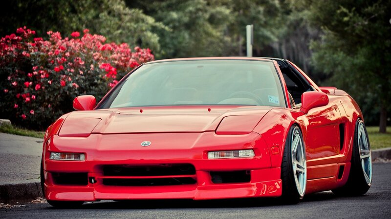 red sports car on street