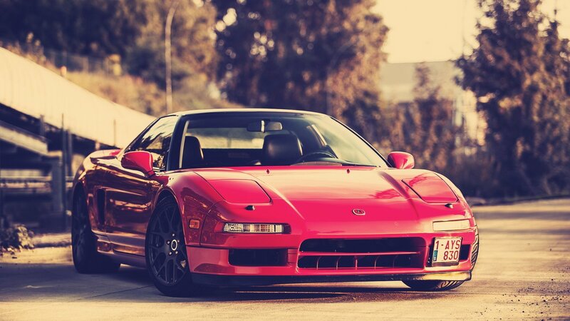 red sports car on street