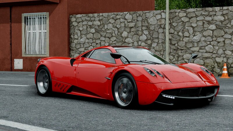 red sports car on street