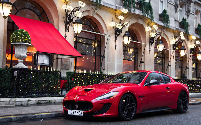 Red Sports Car on Street — Elegant