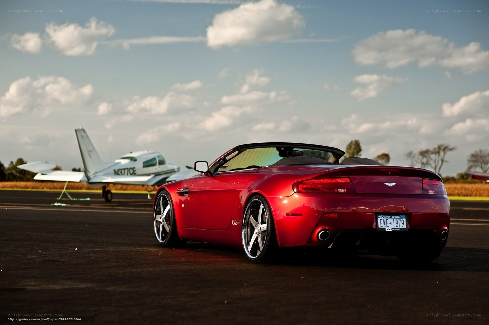 Red sports car on tarmac