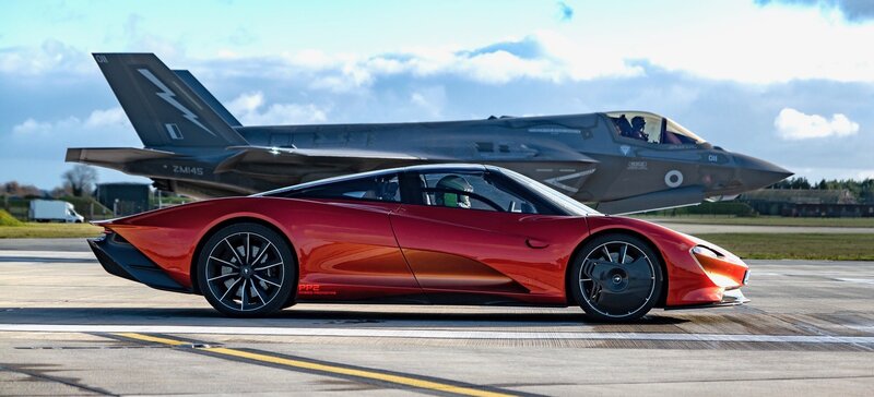 Red Sports Car on Tarmac — Dramatic