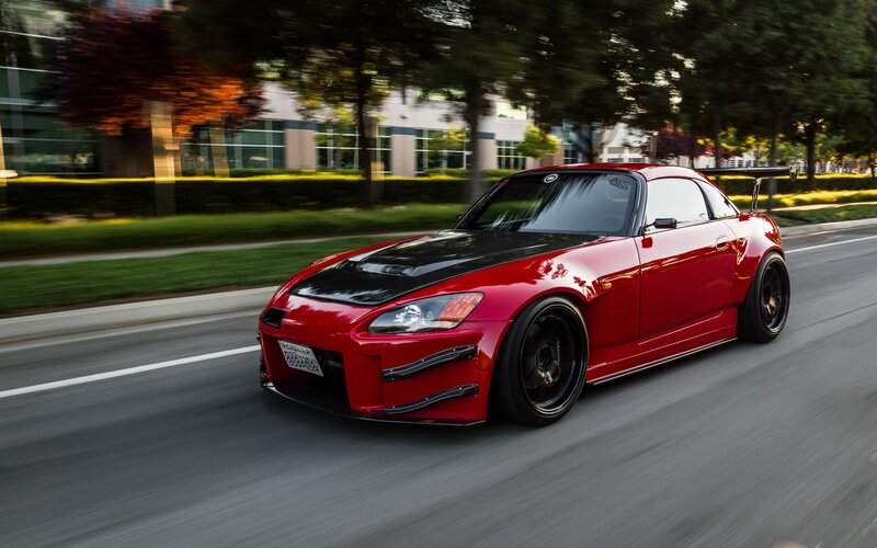 red sports car on the road