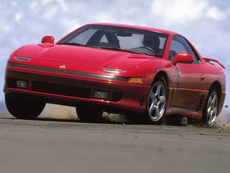 red sports car on track