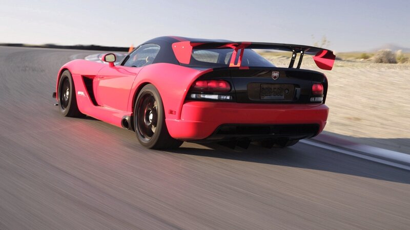 red sports car on track