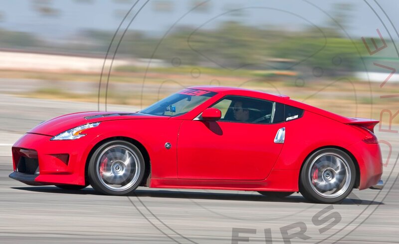 red sports car on track