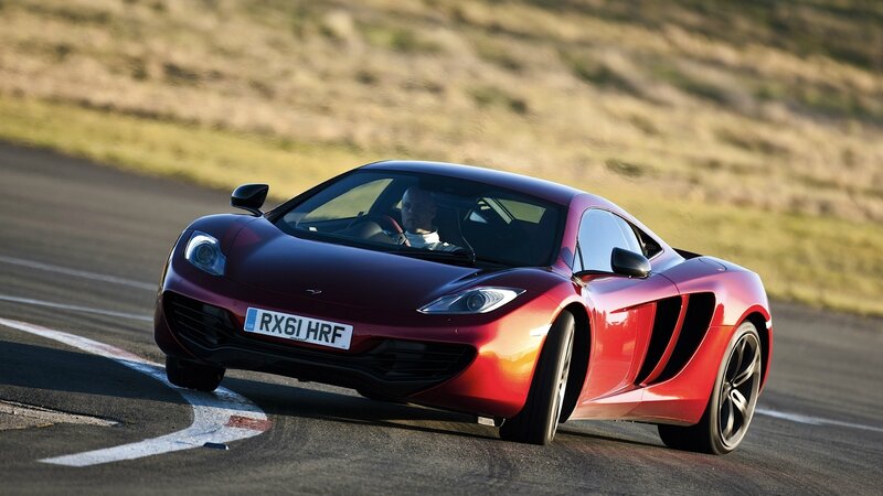 red sports car on track
