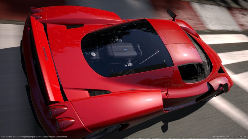 red sports car on track