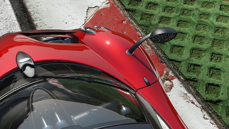 red sports car on track
