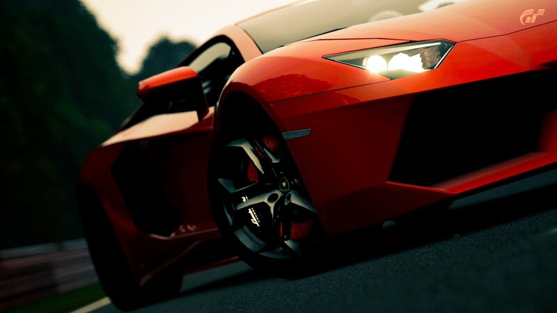red sports car on track