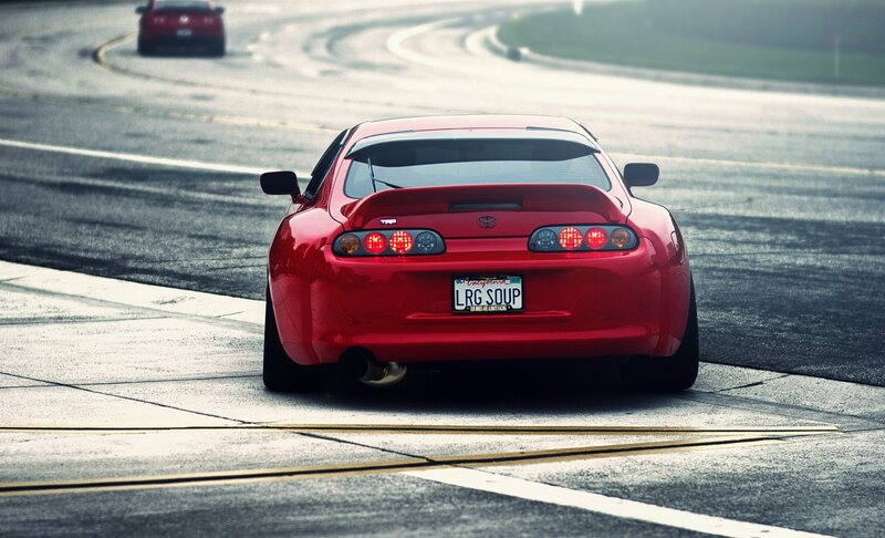 red sports car on track