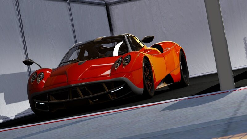 red sports car on track