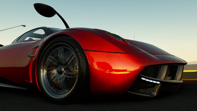 red sports car on track