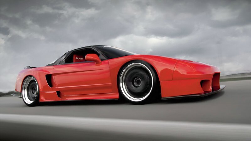 red sports car on track