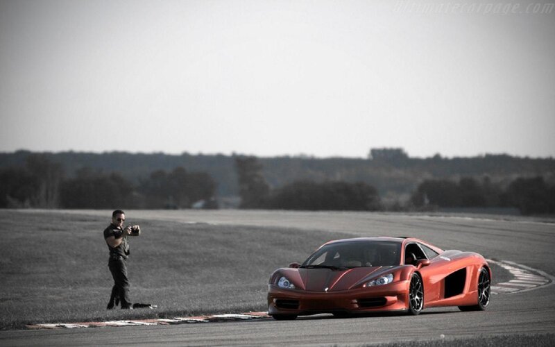 Red Sports Car on Track — Dramatic, Afternoon