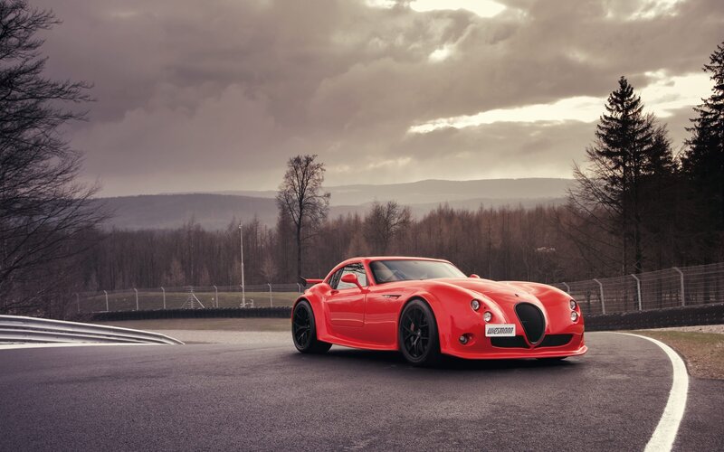 Red Sports Car on Track — Dramatic, Autumn