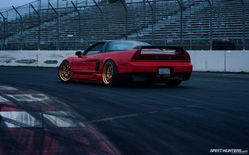 Red Sports Car on Track — Dramatic, Night, Photograph, Race Track, Bleachers
