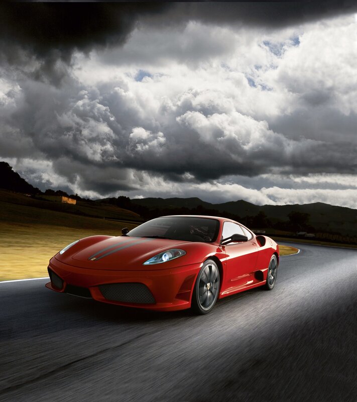 Red Sports Car on Track — Dramatic, Photograph, Race Track, Clouds