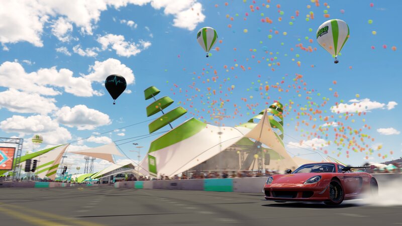 Red Sports Car on Track — Festive