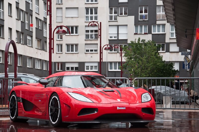 Red sports car on wet street