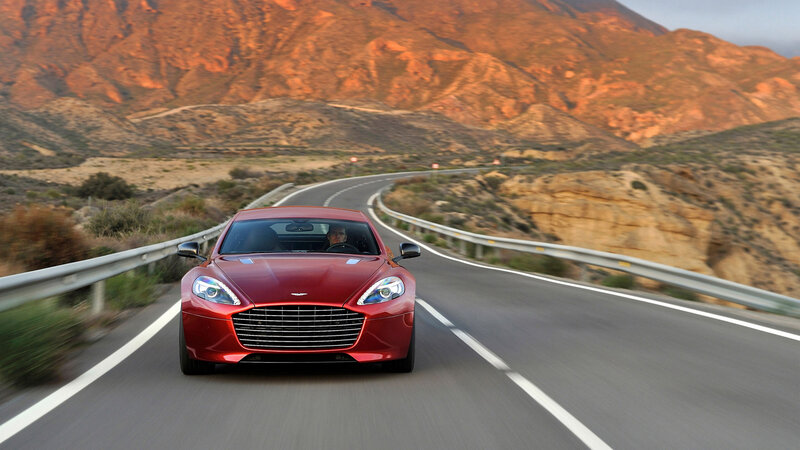 Red sports car on winding road