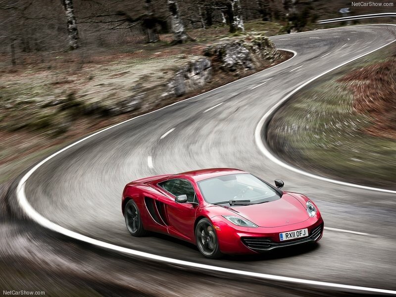 Red sports car on winding road