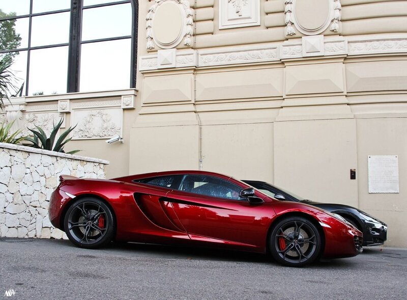 Red sports car parked outside