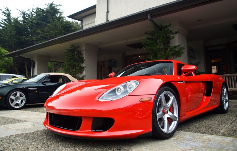 Red sports car parked outside