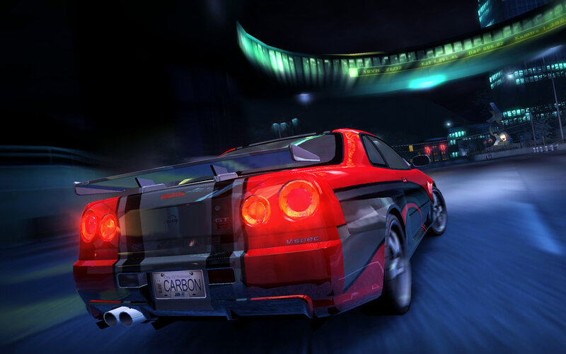 Red sports car racing at night