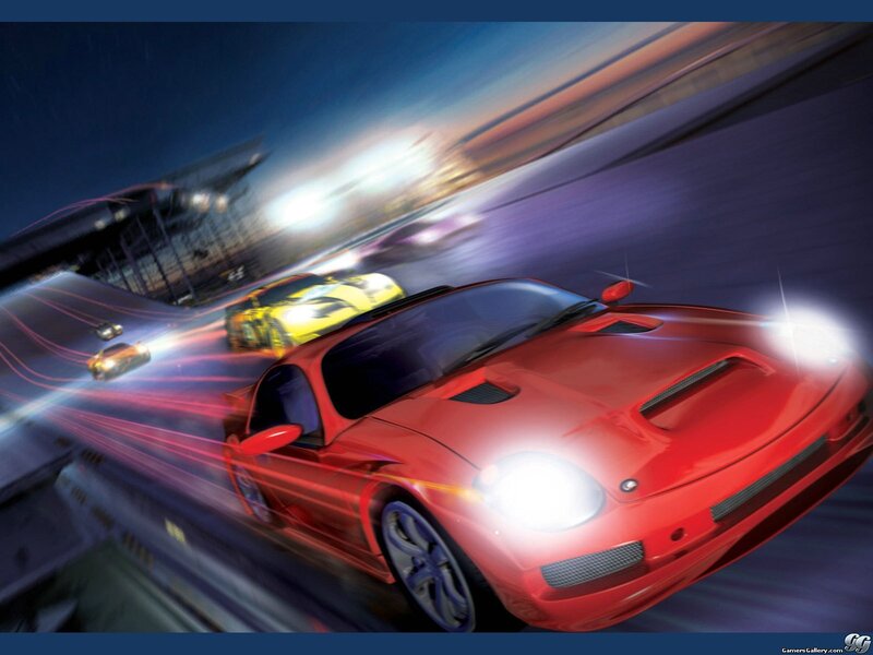 Red sports car racing at night