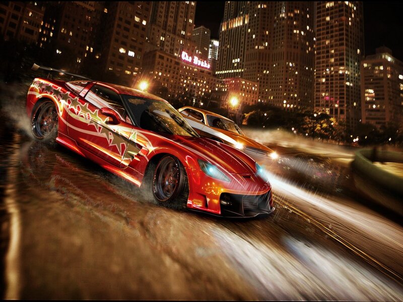 Red sports car racing at night