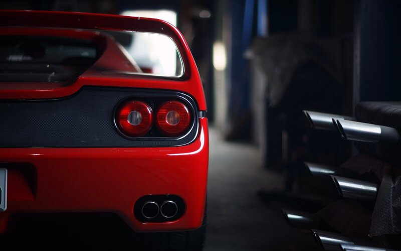 Red Sports Car Rear — Dramatic, Photograph, Exhaust Pipes