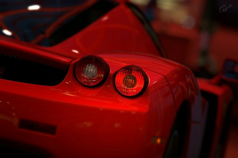 red sports car rear view