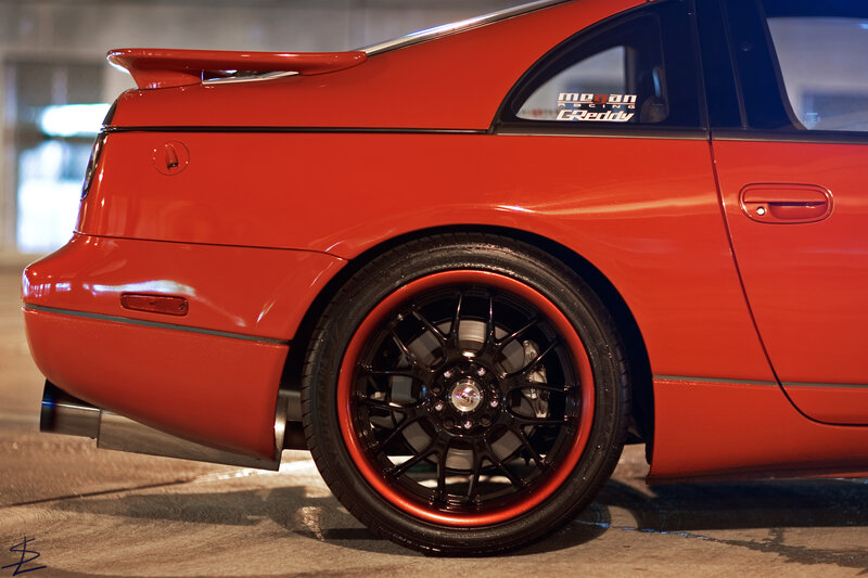 red sports car rear view