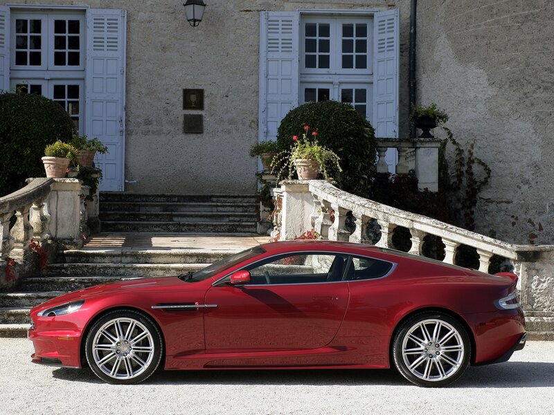 Red Sports Car — Serene, Afternoon, Photograph, Building