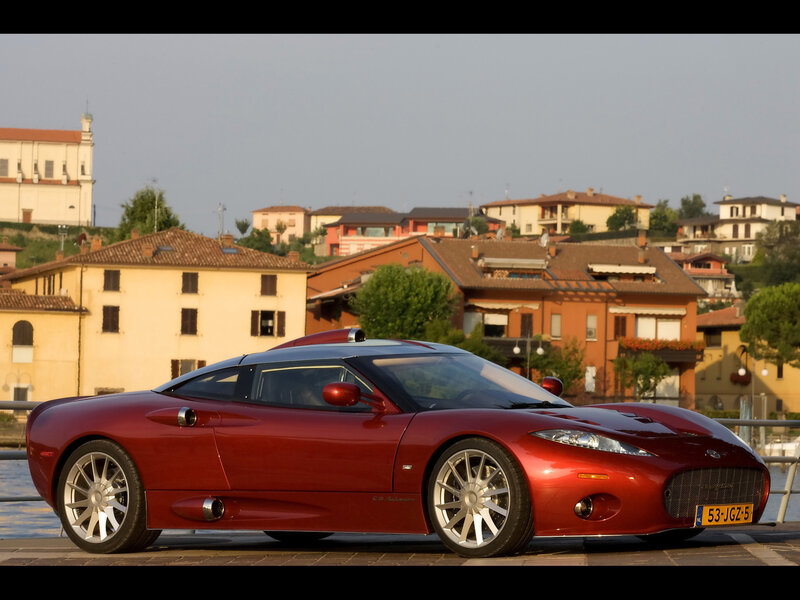 Red Sports Car — Serene, Afternoon, Photograph, Buildings