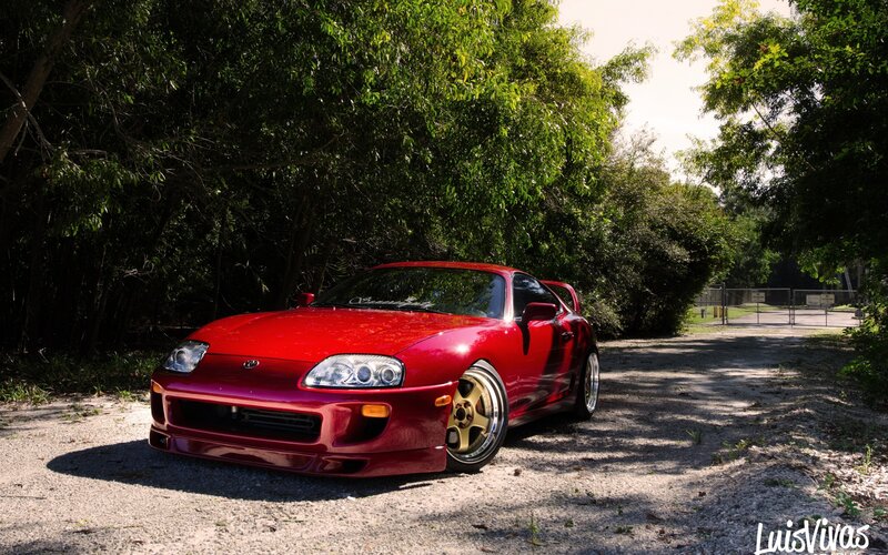 Red Sports Car — Serene, Afternoon, Photograph, Trees, Gravel Road