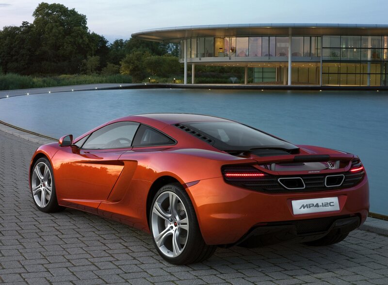 Red Sports Car — Serene, Sunset, Photograph, Building, Pool, Trees