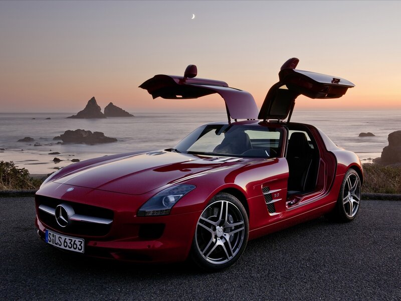 Red Sports Car — Serene, Sunset, Photograph, Ocean, Rocks