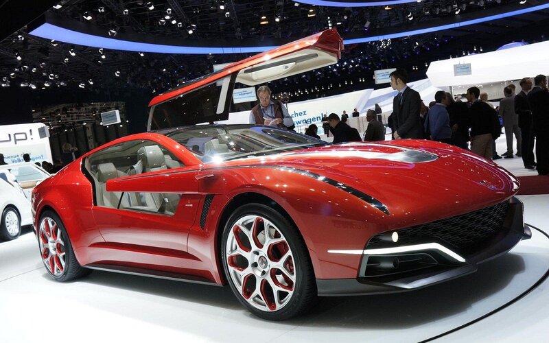Red Sports Car — Showroom, Photograph, People, Auto Show
