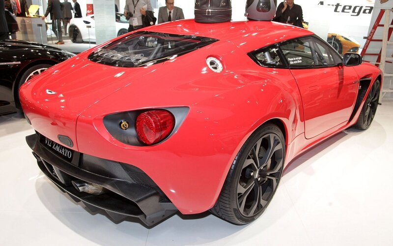 Red Sports Car — Showroom, Photograph, People, Cars