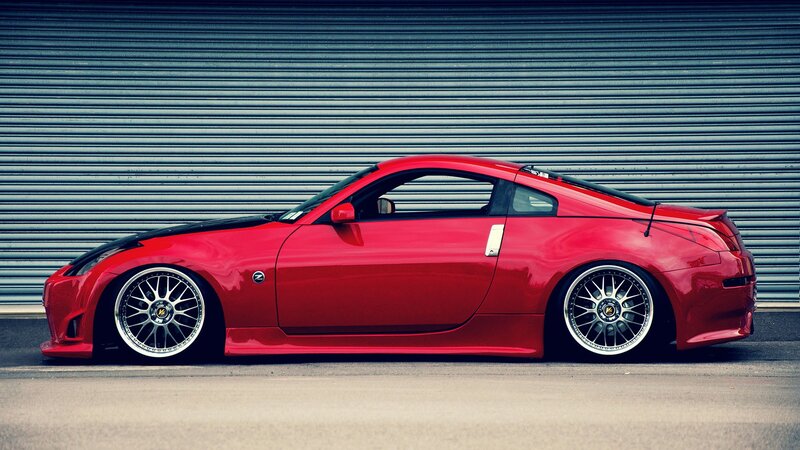 red sports car side profile