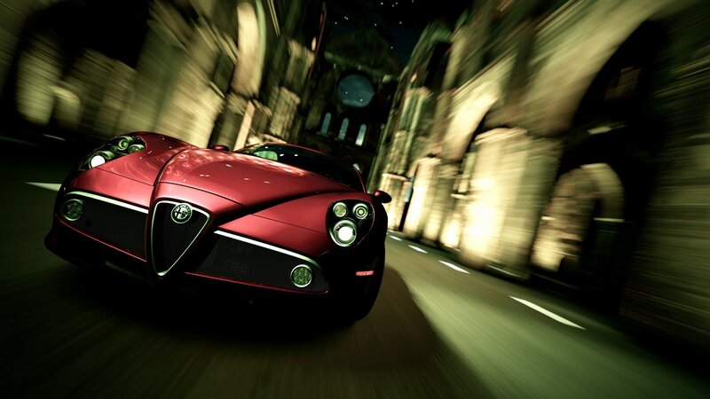 Red sports car speeding through tunnel